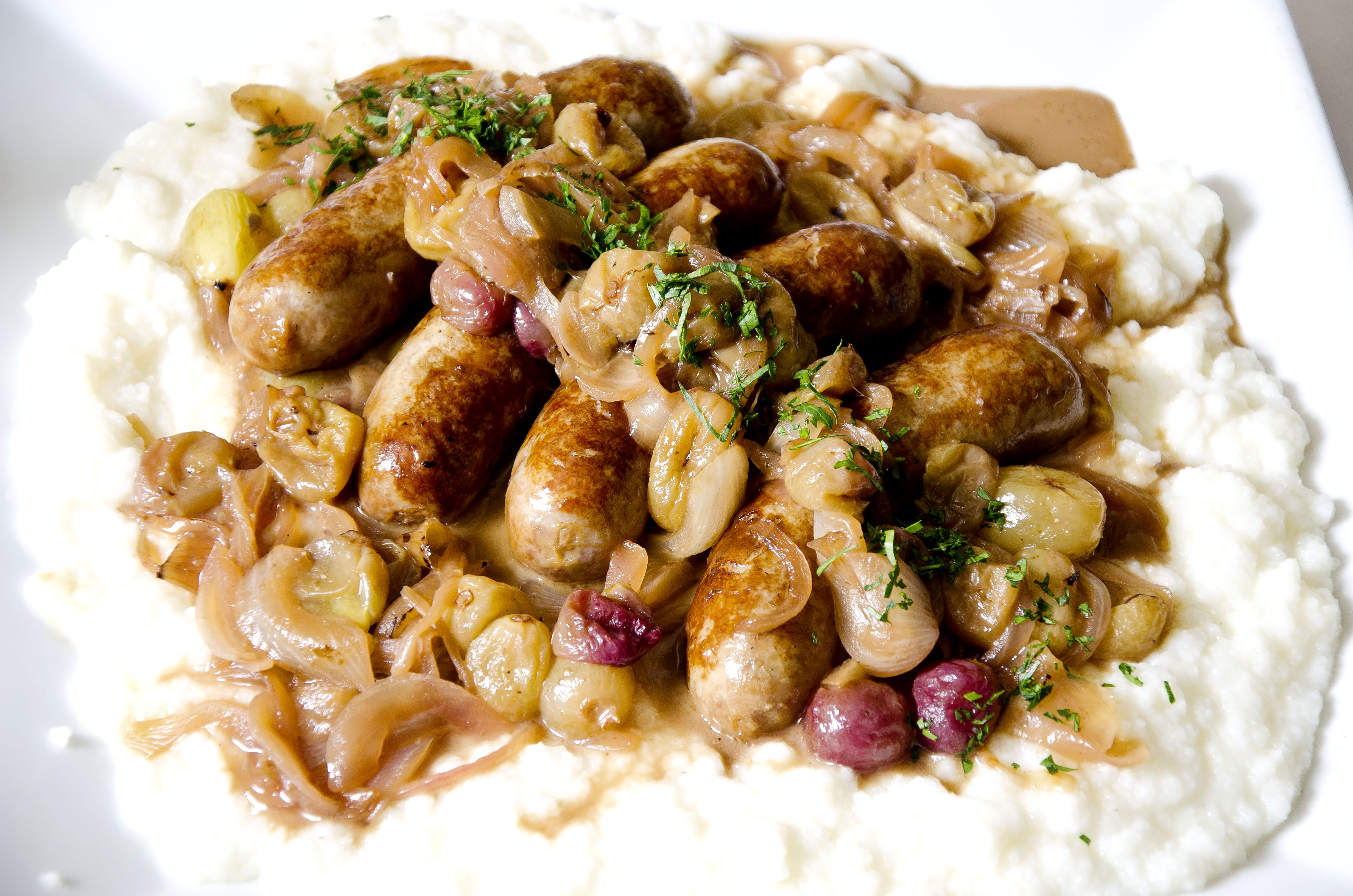 Braised Sausage with Grapes, Onions, and Marsala by Chef Sandra Lotti